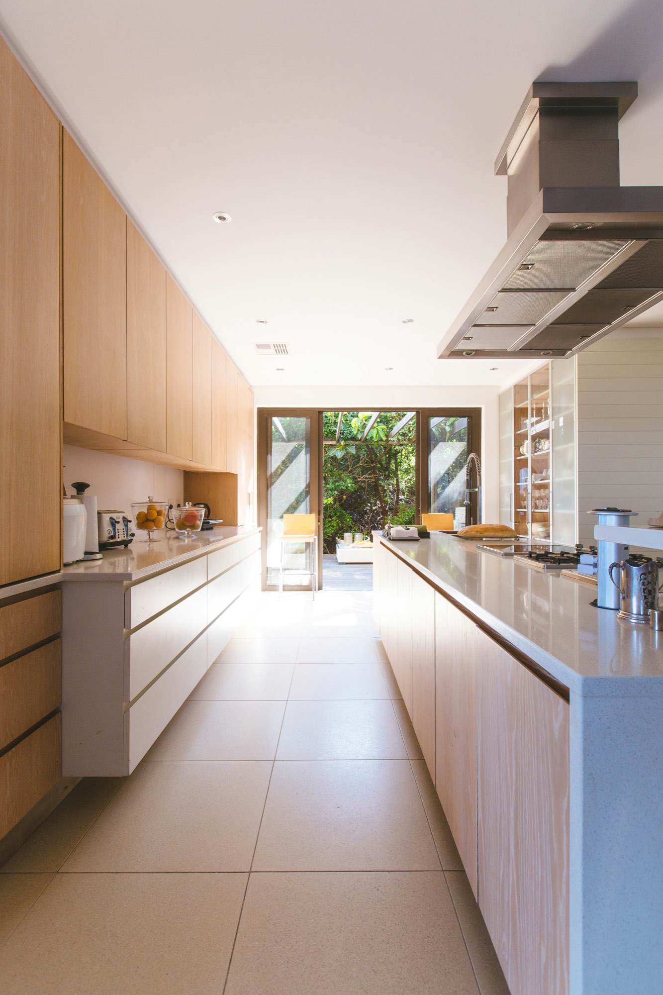 A warm oak kitchen with garden doors, cleaned end to end