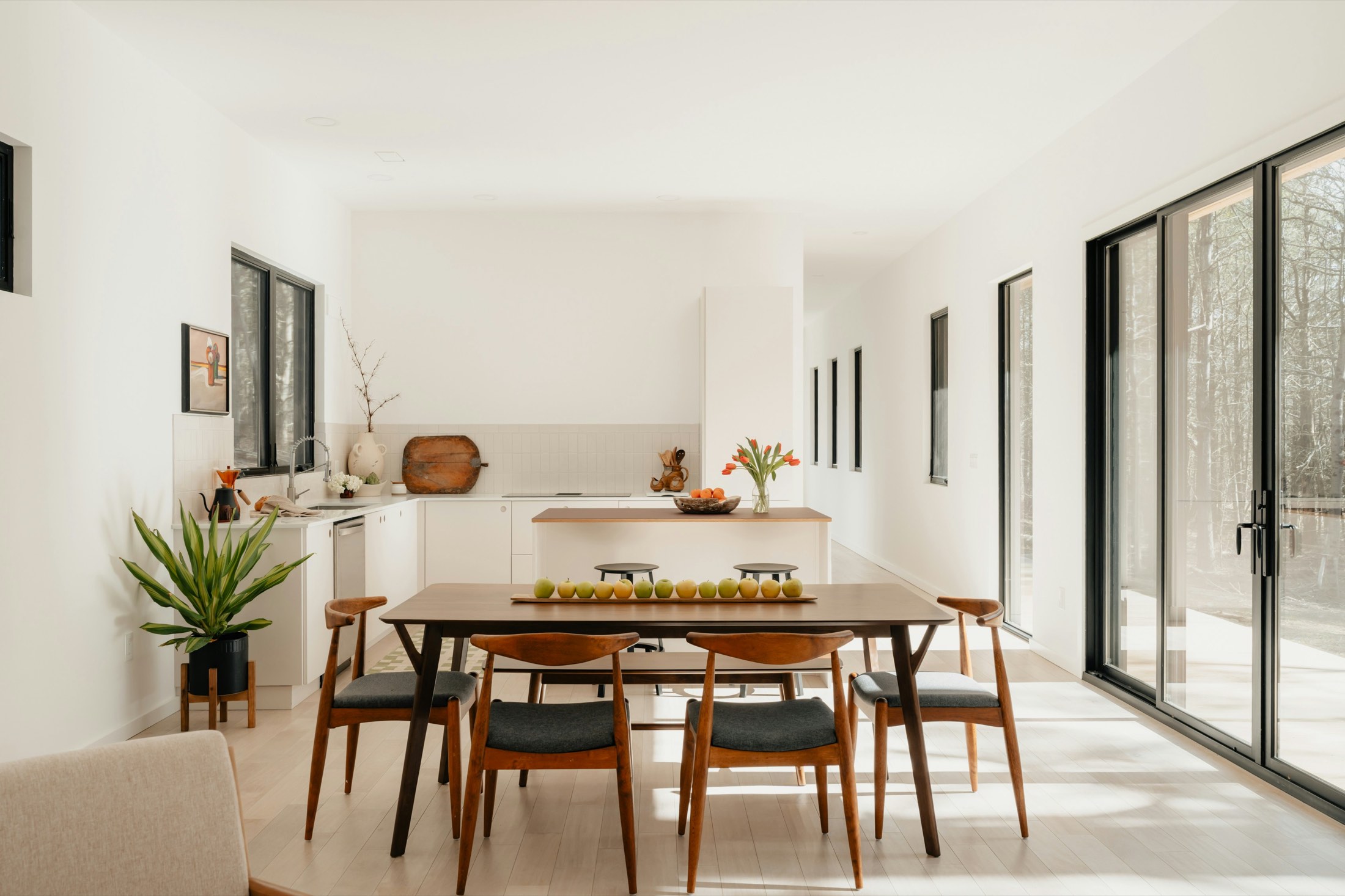 A bright, immaculate open-plan kitchen and dining room